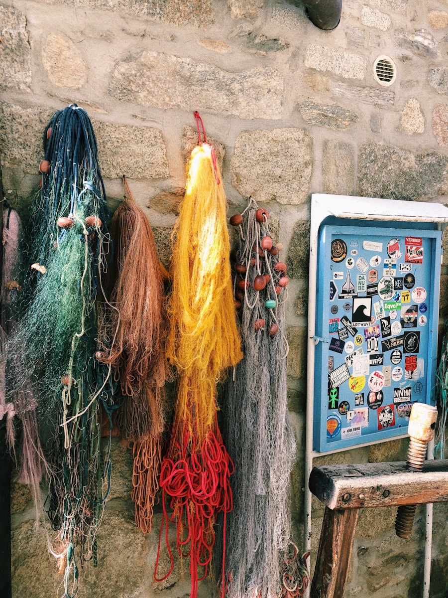 a bunch of fishing nets hanging on a wall