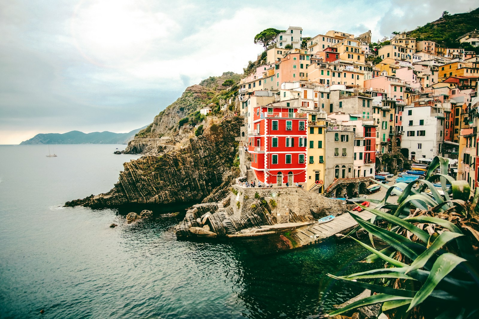 assorted-color buildings and body of water